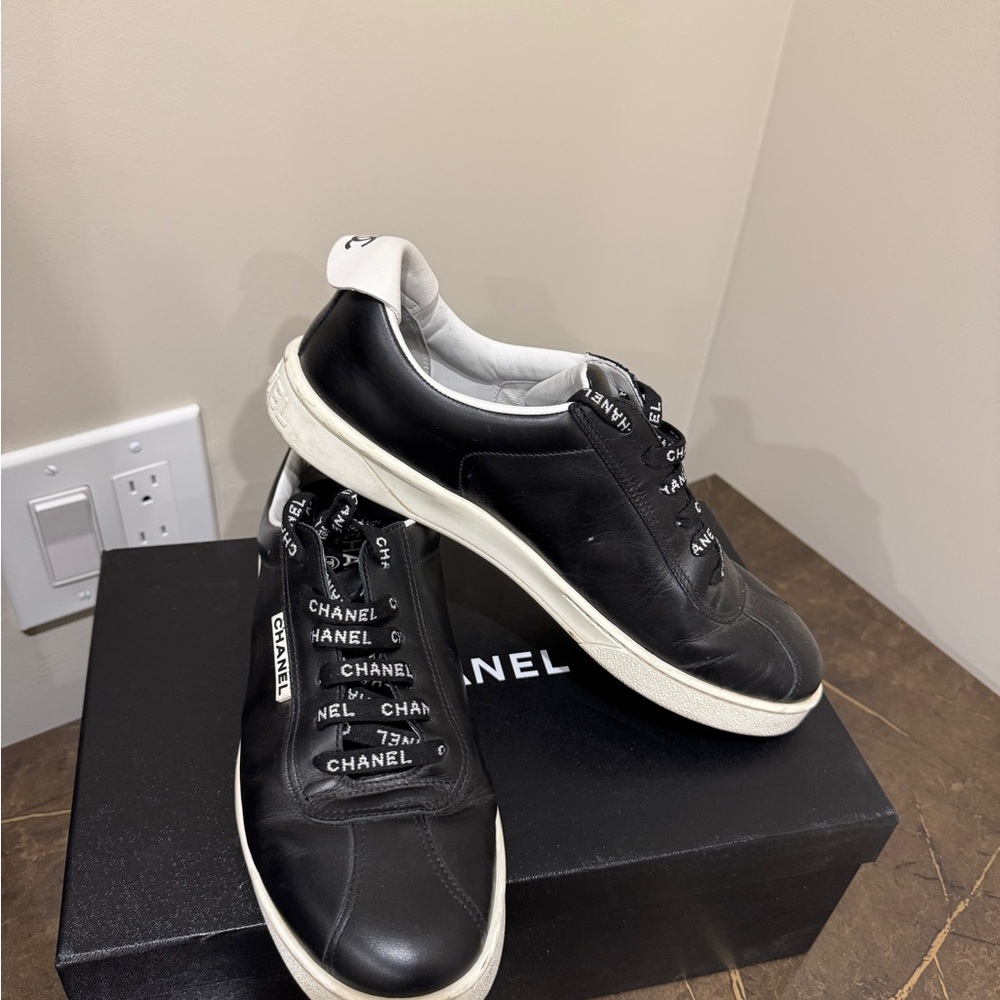 CHANEL Black and White Sneakers Sleek Design